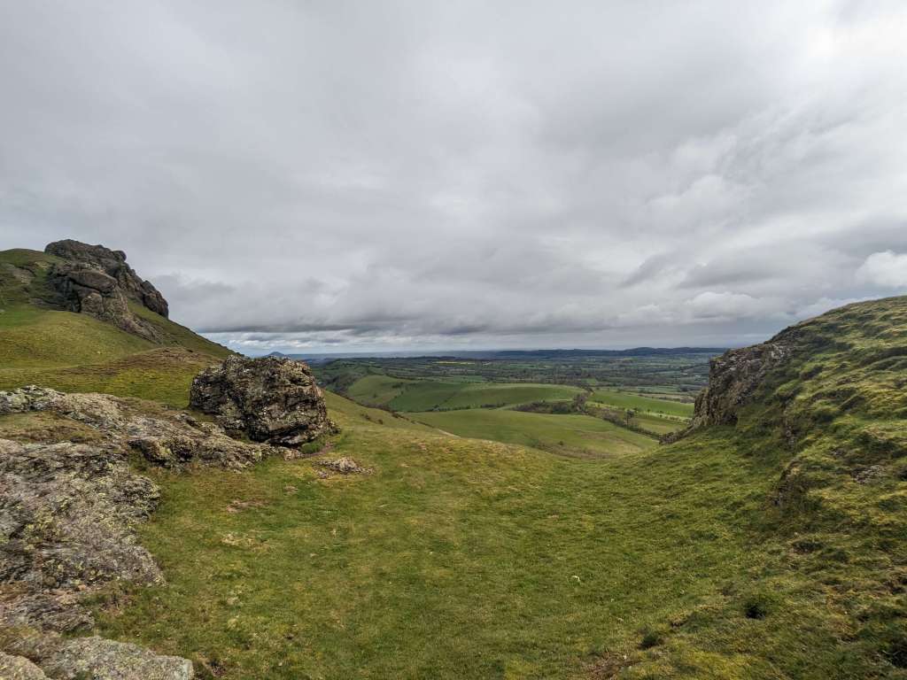 View on footpath of gateway to caer caradoc hill fort, looking towards wenlock edge.
