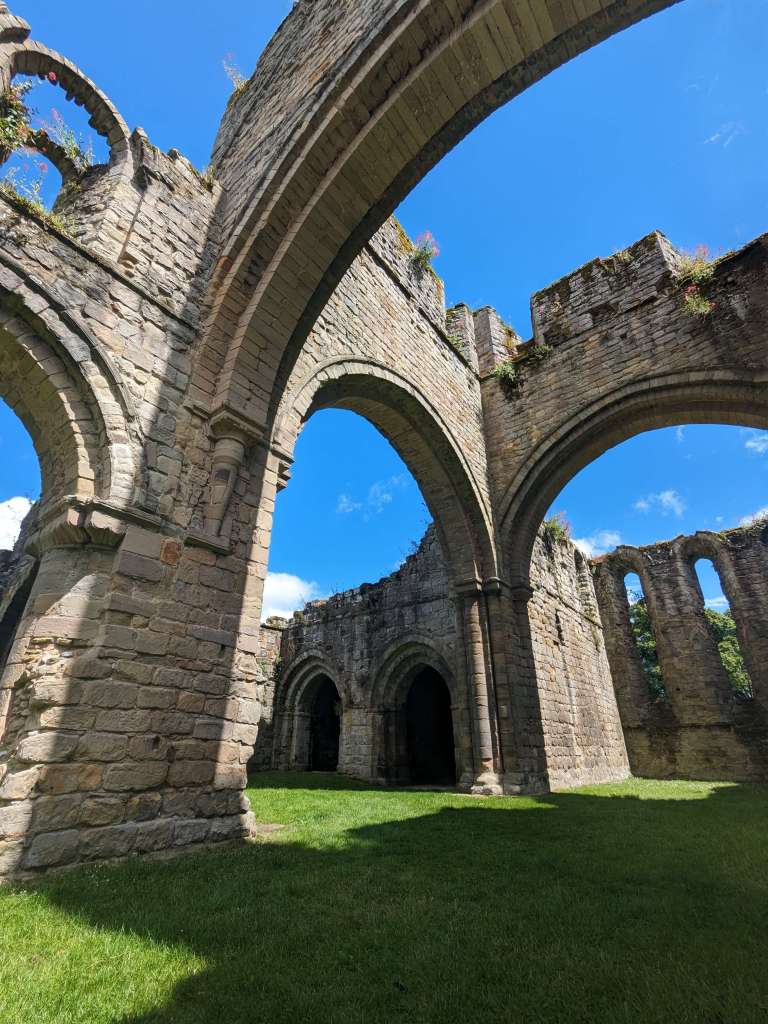 Buildwas Abbey tower ruins and looking to the sky