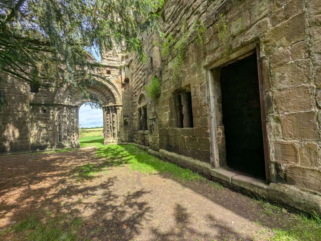 Intricate door and offset rooms in the cloister of lilleshall abbey